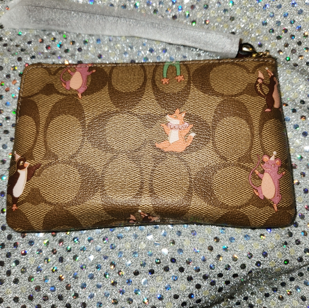Coach wristlet party animal